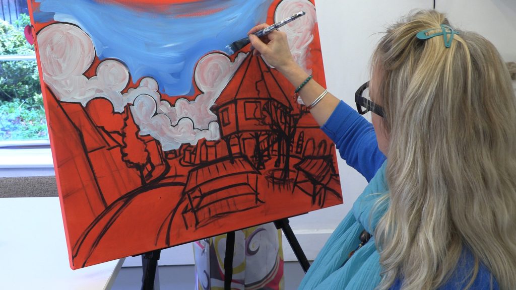 Artist Emily Chapman painting